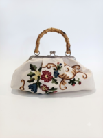 Borsa fermaglio con manico bambù